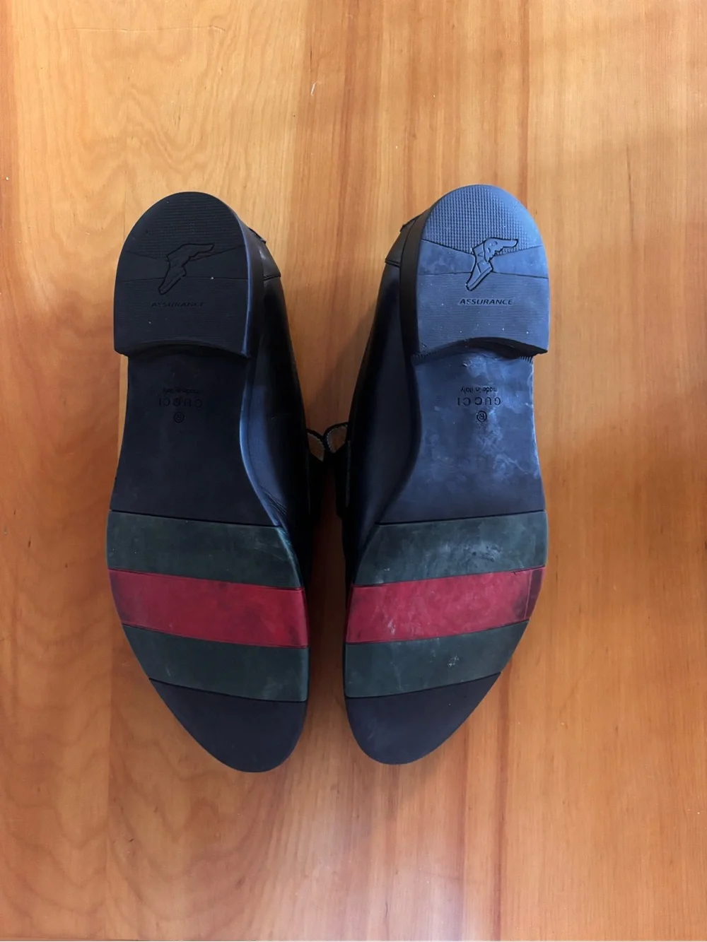 Gucci Black Leather Penny Loafers for Men